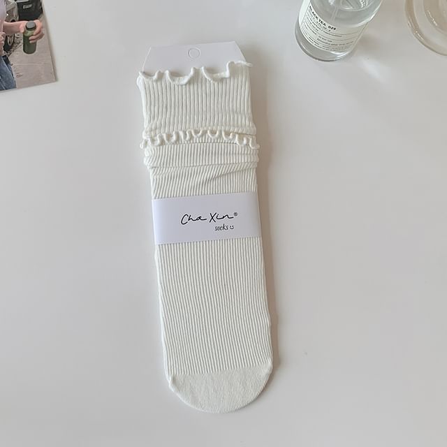 Einfarbige Socken mit gekräuseltem Rand