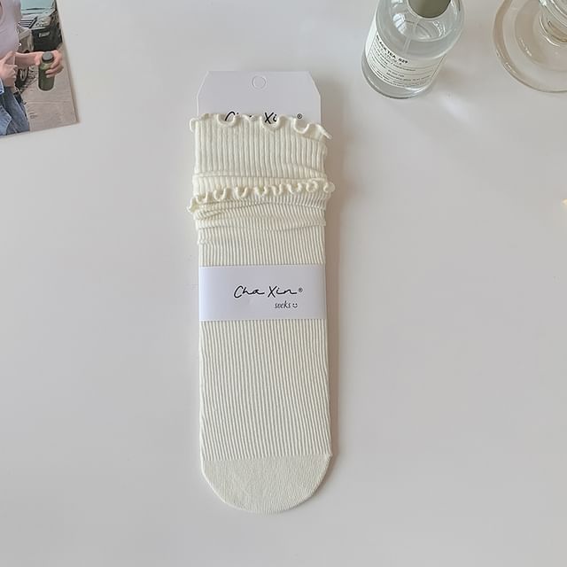 Einfarbige Socken mit gekräuseltem Rand