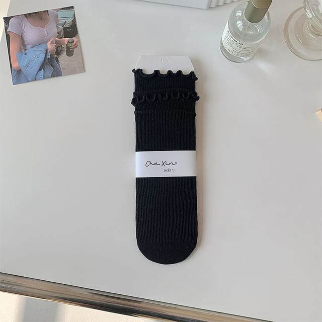 Einfarbige Socken mit gekräuseltem Rand