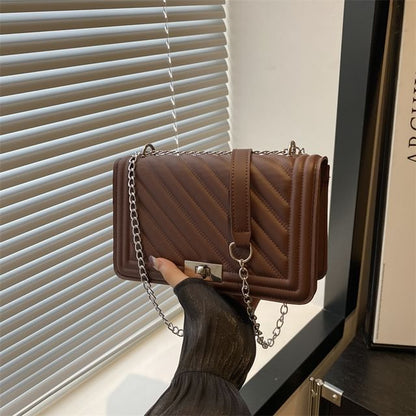 Quilted Buckle Shoulder Bag