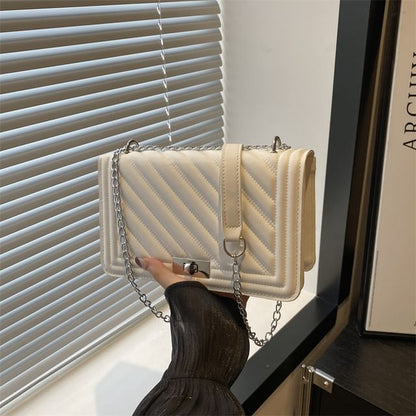 Quilted Buckle Shoulder Bag