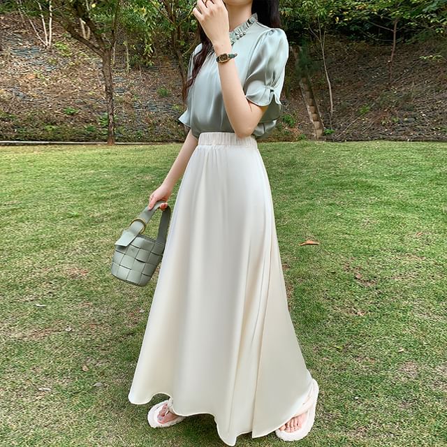 Solid High-Rise Flared Maxi Skirt with Clean Lines