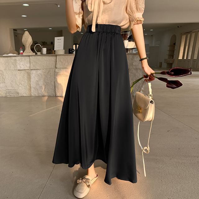Solid High-Rise Flared Maxi Skirt with Clean Lines