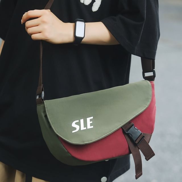 Lettering Two-Tone Buckled Flap Crossbody Bag