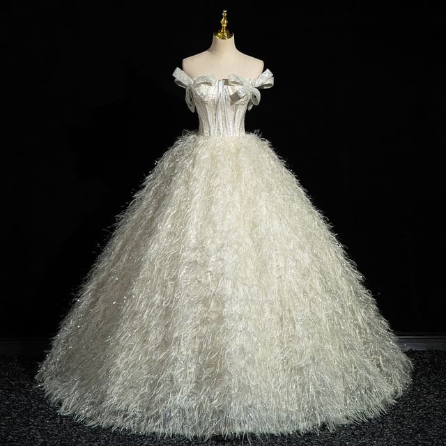 Strapless Glitter Bow Accent Fringed Corset Ball Gown