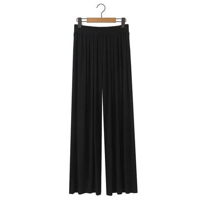 Plus Size Off-Shoulder Sleeveless Asymmetric Tee with High-Rise Wide Leg Pants and Flared Maxi Skirt