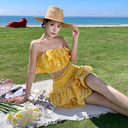 Duo: Sleeveless Asymmetric Mesh Crop Top with High-Rise Layered Mini Skirt