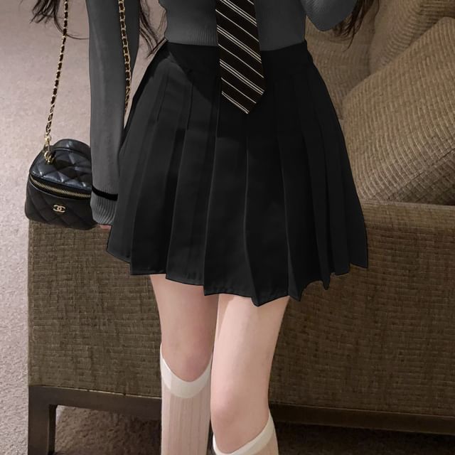 Collared Long Sleeve Sweater with Tie Detail and Pleated Mini Skirt