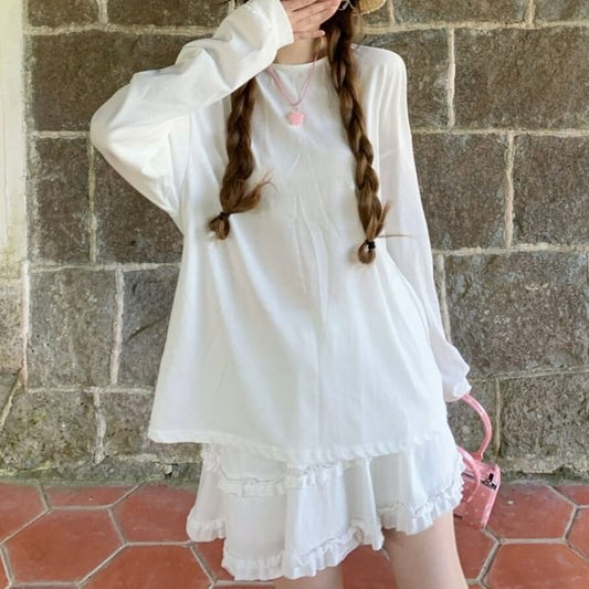 Set: Long-Sleeve Crew Neck Plain Sheer Panel Tie Back T-Shirt + Elastic Waist Frill Trim Mini A-Line Skirt