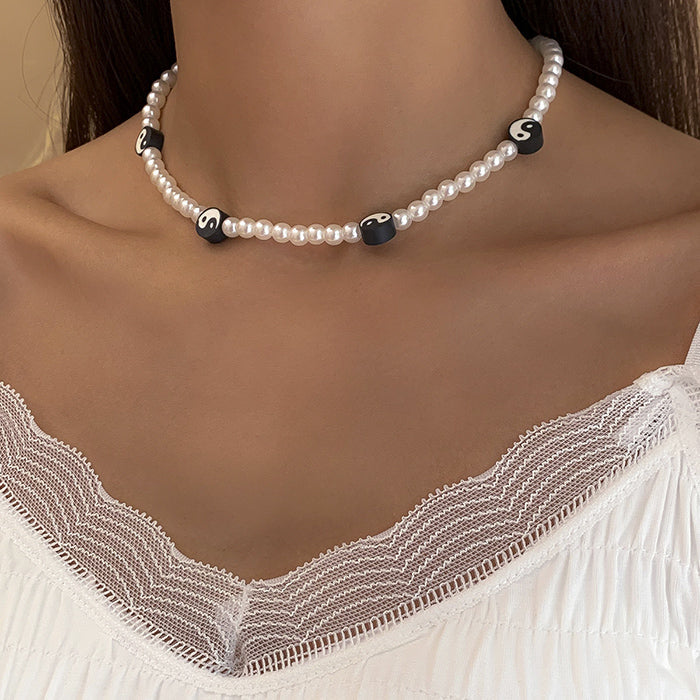 Collier ras du cou en perles Yin Yang