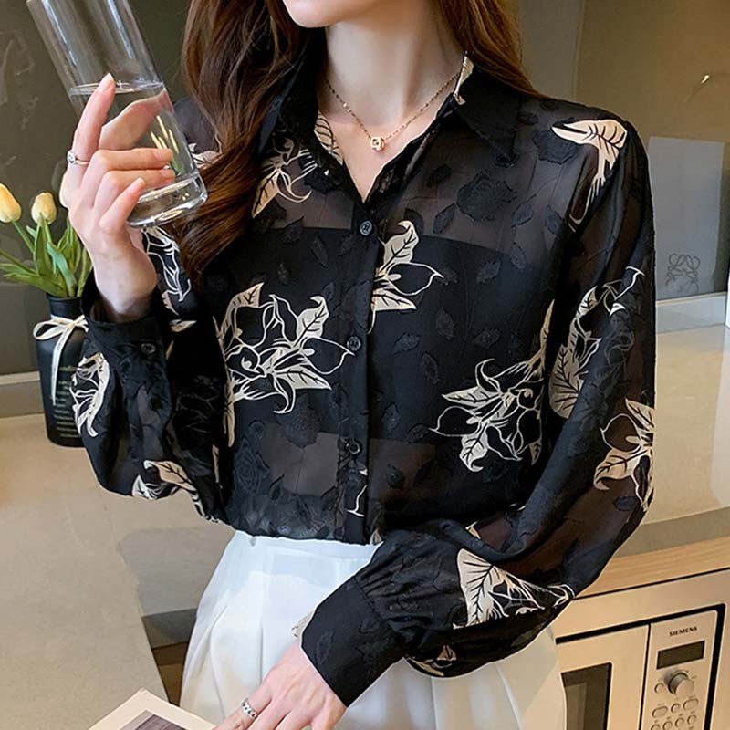 Chemise en mousseline à manches bouffantes et imprimé floral noir