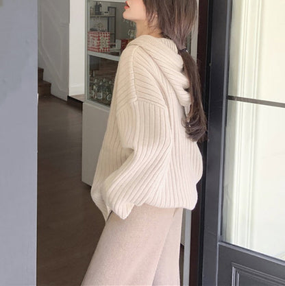 Beige knit hoodie with buttons in front