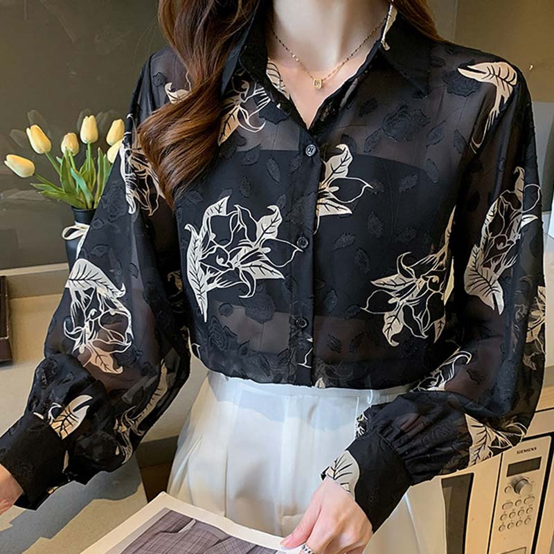 Chemise en mousseline à manches bouffantes et imprimé floral noir