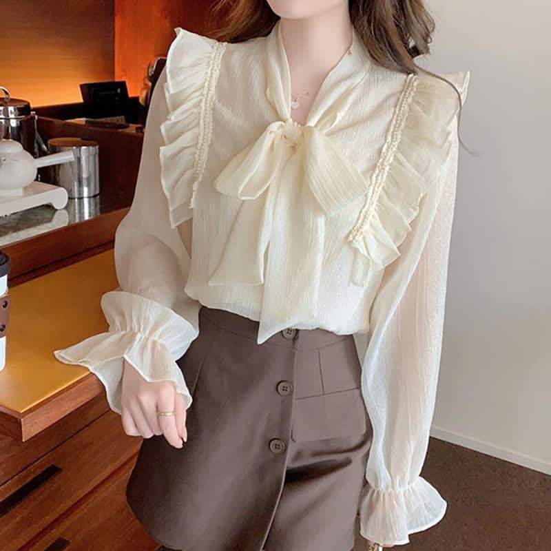 Chemise élégante en mousseline à volants et nœud papillon