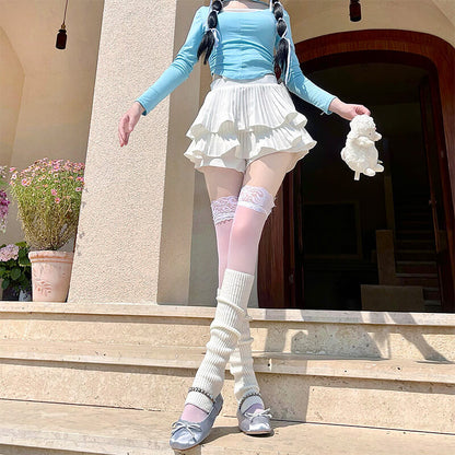 Bas et jambières blancs et roses mignons