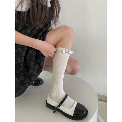 Bas à nœuds de couleur unie