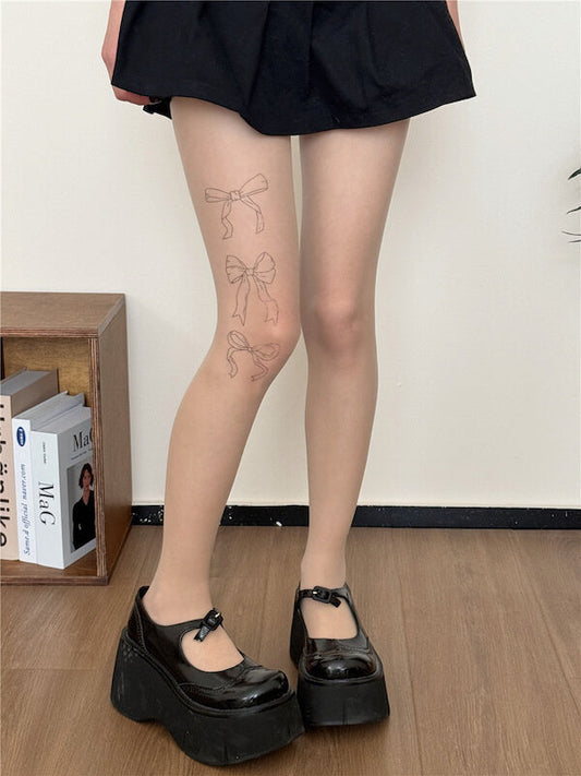 Strumpfhose mit Feen-Schleifen-Tattoo