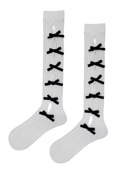 Strümpfe aus Spitze mit Schleife