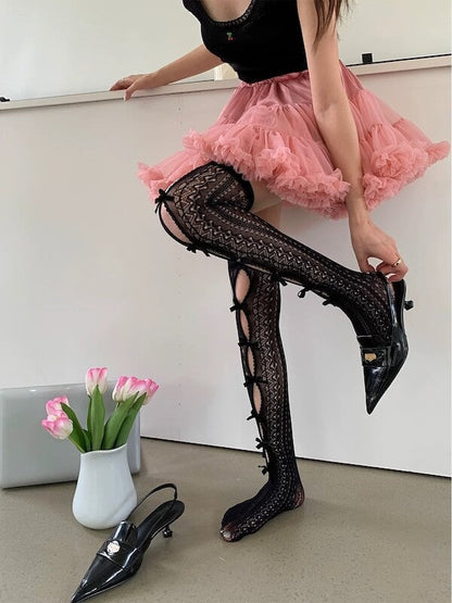 Strümpfe aus Spitze mit Schleife