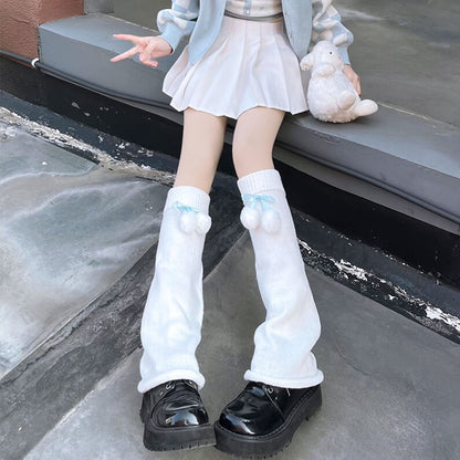 Jambières moelleuses à pompon