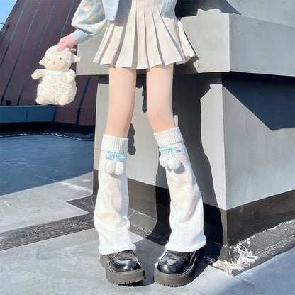 Jambières moelleuses à pompon