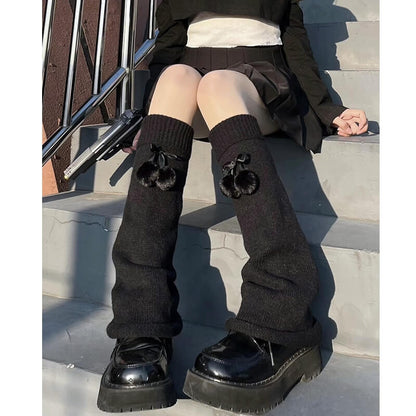 Jambières moelleuses à pompon