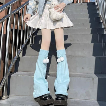 Jambières moelleuses à pompon