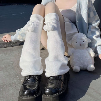 Jambières moelleuses à pompon