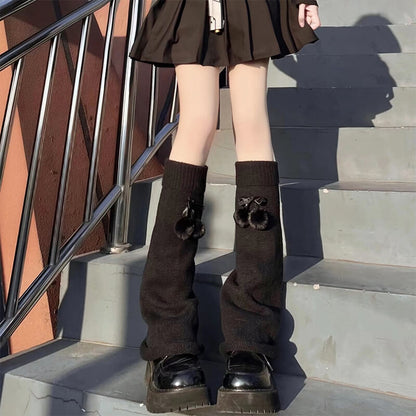 Jambières moelleuses à pompon