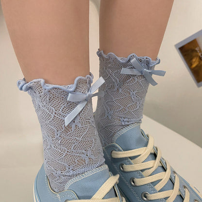 Chaussettes en dentelle avec nœud fleuri