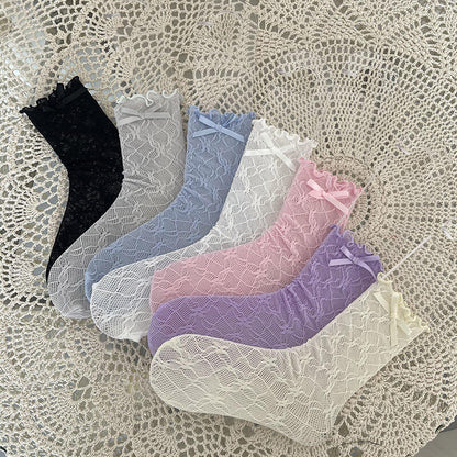 Chaussettes en dentelle avec nœud fleuri