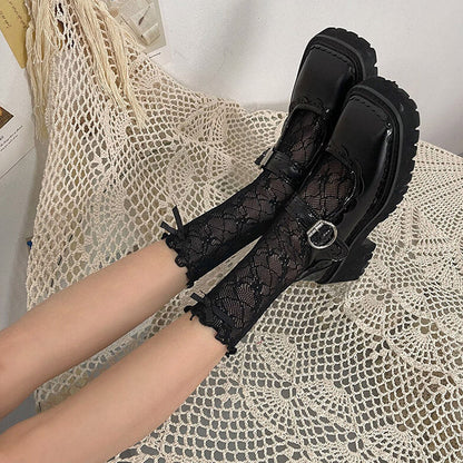 Chaussettes en dentelle avec nœud fleuri