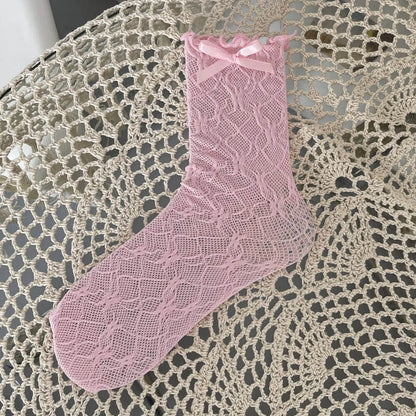 Chaussettes en dentelle avec nœud fleuri