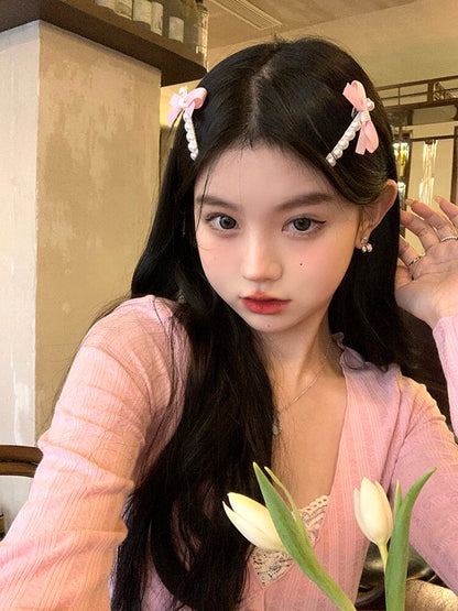 Süße Haarspange mit Perlen und Schleife