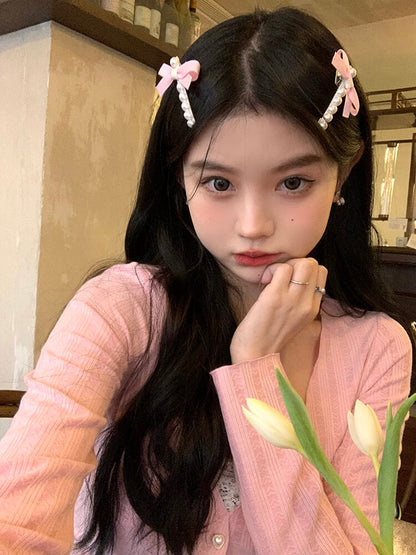 Süße Haarspange mit Perlen und Schleife