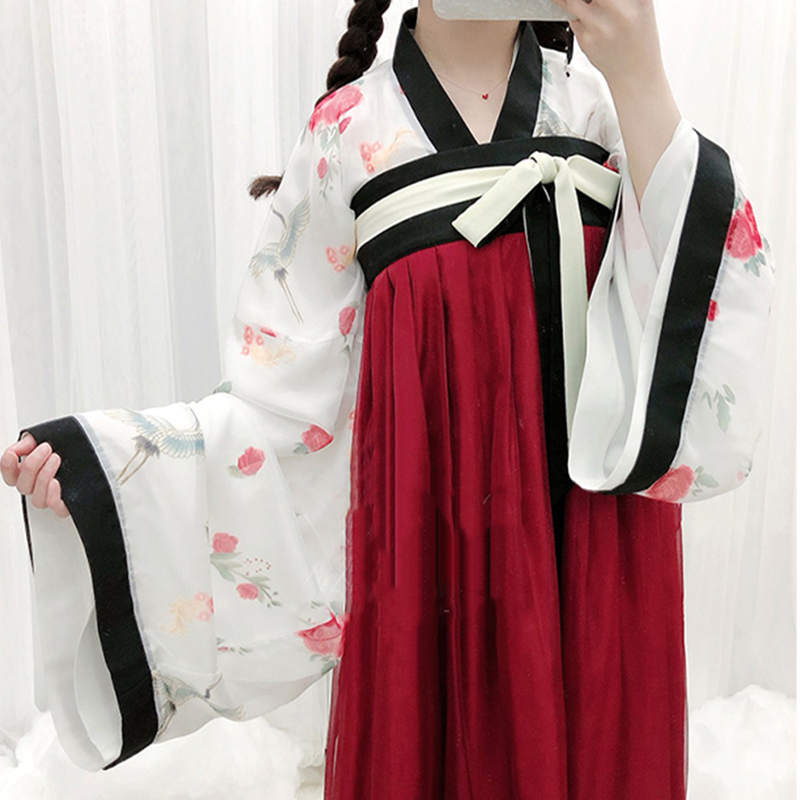 Ensemble élégant haut et jupe kimono à imprimé floral et col en V