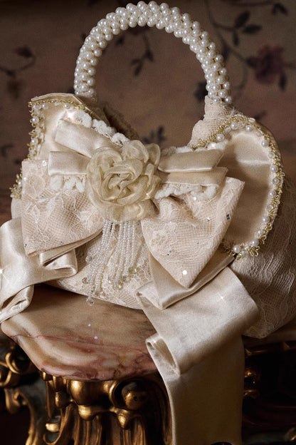 Gilded Pearl Bow Satin Handbag in Champagne