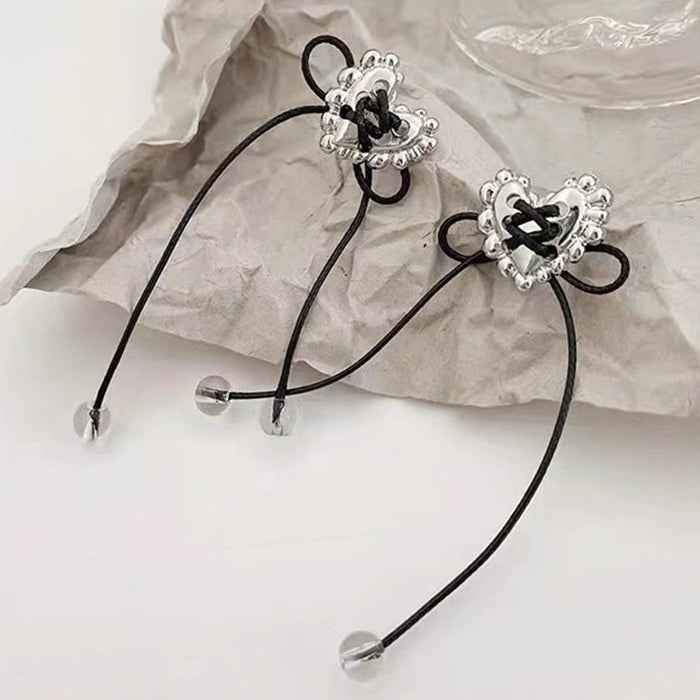 Boucles d'oreilles en forme de cœur avec nœud