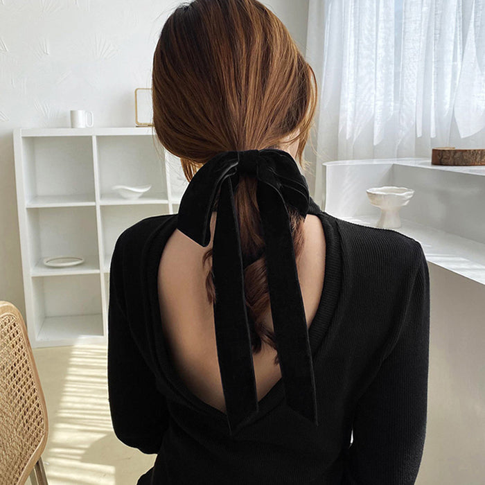 Elegante schwarze Haarschleife aus Samt