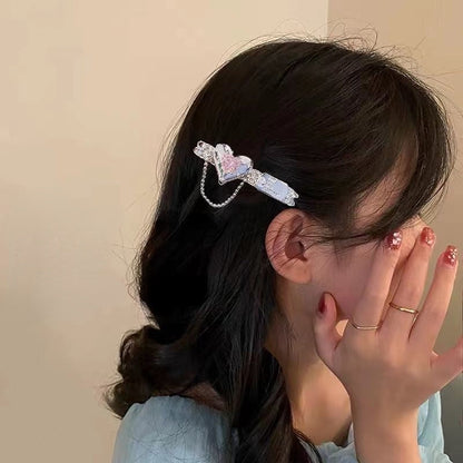 Entenschnabelclip mit süßer Herz-Quaste MK18794