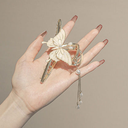 Pince à cheveux papillon en perles MK18669